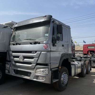 주문 사용된 시노트럭 호우 트랙터 트럭 엔진 용량 8L 및 공기 서스펜션 운전석 online manufacture